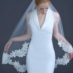 933-40

40” long (72”) with 23” cut edge and a 4 ½” Venise lace edge bottom on a silver comb… (Ivory or white lace)…….. All tulle colors……………………………………………………..