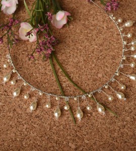  A-5637 A headband of linear teardrop pearls and round pearls on a thin base wrapped with delicate pearls & crystals……..(Ivory or white pearls)………*Silver or gold 