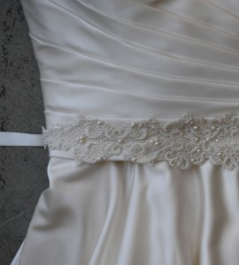  B-127 83” long 5/8” double face satin sash with a 15 ½” open lace appliqué accented with freshwater pearls, seed beads & clear beads..……(Diamond white or ivory lace appliqué)… All ribbon colors…… 