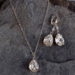 J-9150 J-9151

J-9150 2″ long earrings of set faceted pear shape rhinestone pendants.

(To match J-9151) *Silver Only

J-9151 17 ½” necklace of delicate chain with a set pear shape faceted rhinestone pendant.

(To match J-9150) *Silver Only