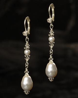 J-9447

1 ½” hanging earring on a French hook accented with a rhinestone and a teardrop pearl…. (Ivory or white pearl)………….*Silver