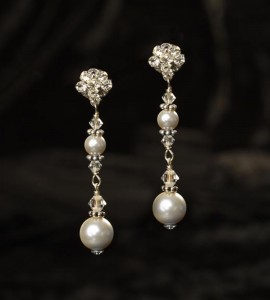 J-9448

1 ½” hanging earring on a rhinestone post with a round 5 & 8mm pearl.. (Ivory or white pearl) *Silver