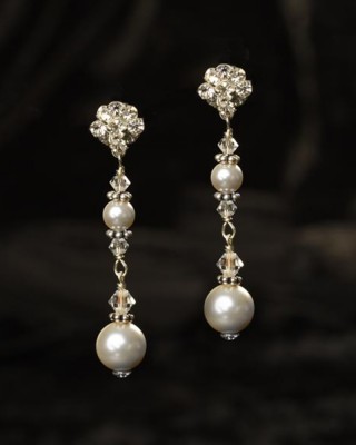 J-9448

1 ½” hanging earring on a rhinestone post with a round 5 & 8mm pearl.. (Ivory or white pearl) *Silver